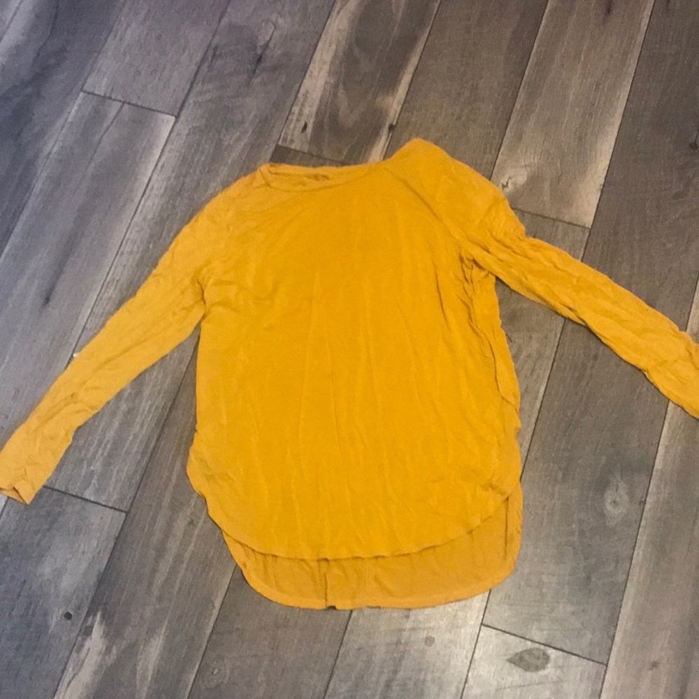 yellow long sleeve shirt